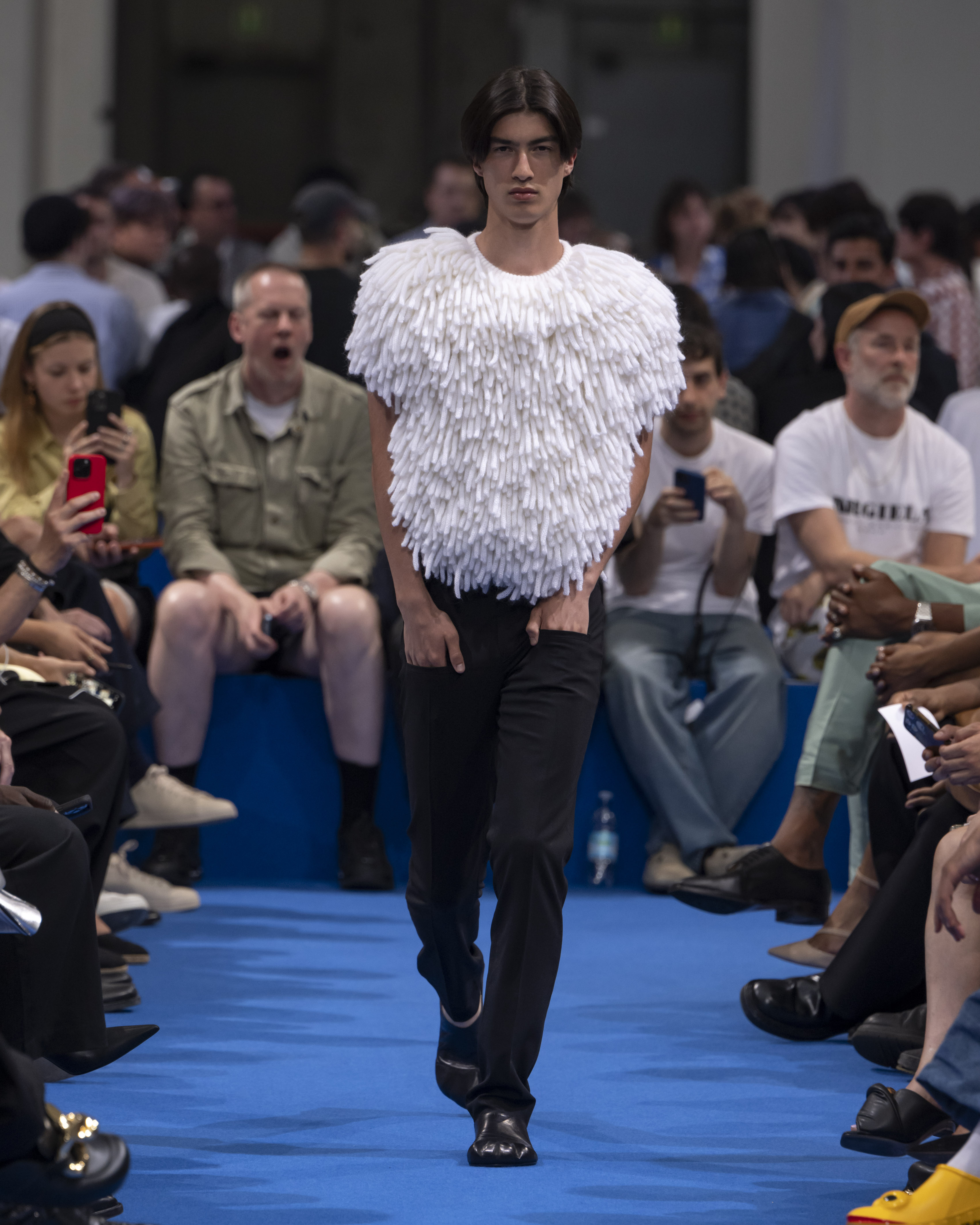 Fashion designer Jonathan Anderson walks the runway at the JW